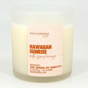 A white soy candle in a clear glass container featuring a label that reads 'Hawaiian Sunrise' with a description of the scent as 'with island orange.' The candle is made from 100% natural soy and has a burn time of 46-60 hours.